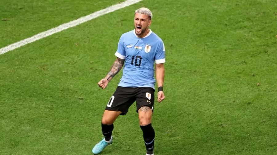 Arrascaeta comemorando gol na Copa do Mundo de 2022